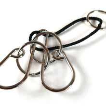 Load image into Gallery viewer, Defiled Heart - wire puzzle